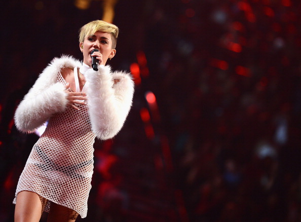 LAS VEGAS, NV - SEPTEMBER 21:  Entertainer Miley Cyrus performs onstage during the iHeartRadio Music Festival at the MGM Grand Garden Arena on September 21, 2013 in Las Vegas, Nevada.  (Photo by Mark Davis/Getty Images for Clear Channel)